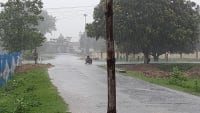 Rain Buniadpur Railway Station two boys playing in rain